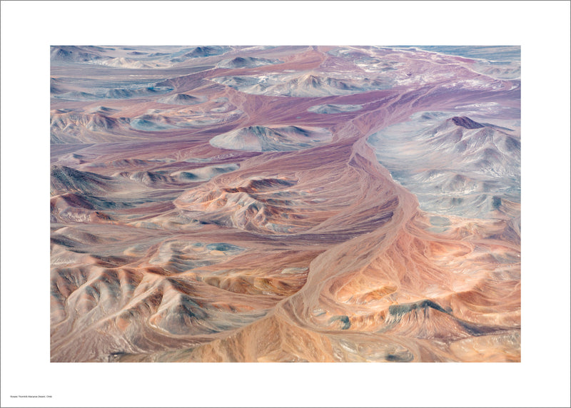 Poster of the Atacama desert, Chile. A beautiful colour landscape of mountains from above, the hills in hues of red, orange, purple and blue, the landscape is swirling almost looking like abstract art. Posters available in different sizes.